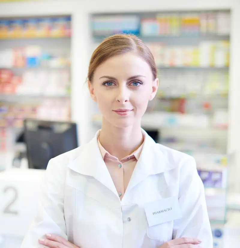 female pharmacist with arms folded